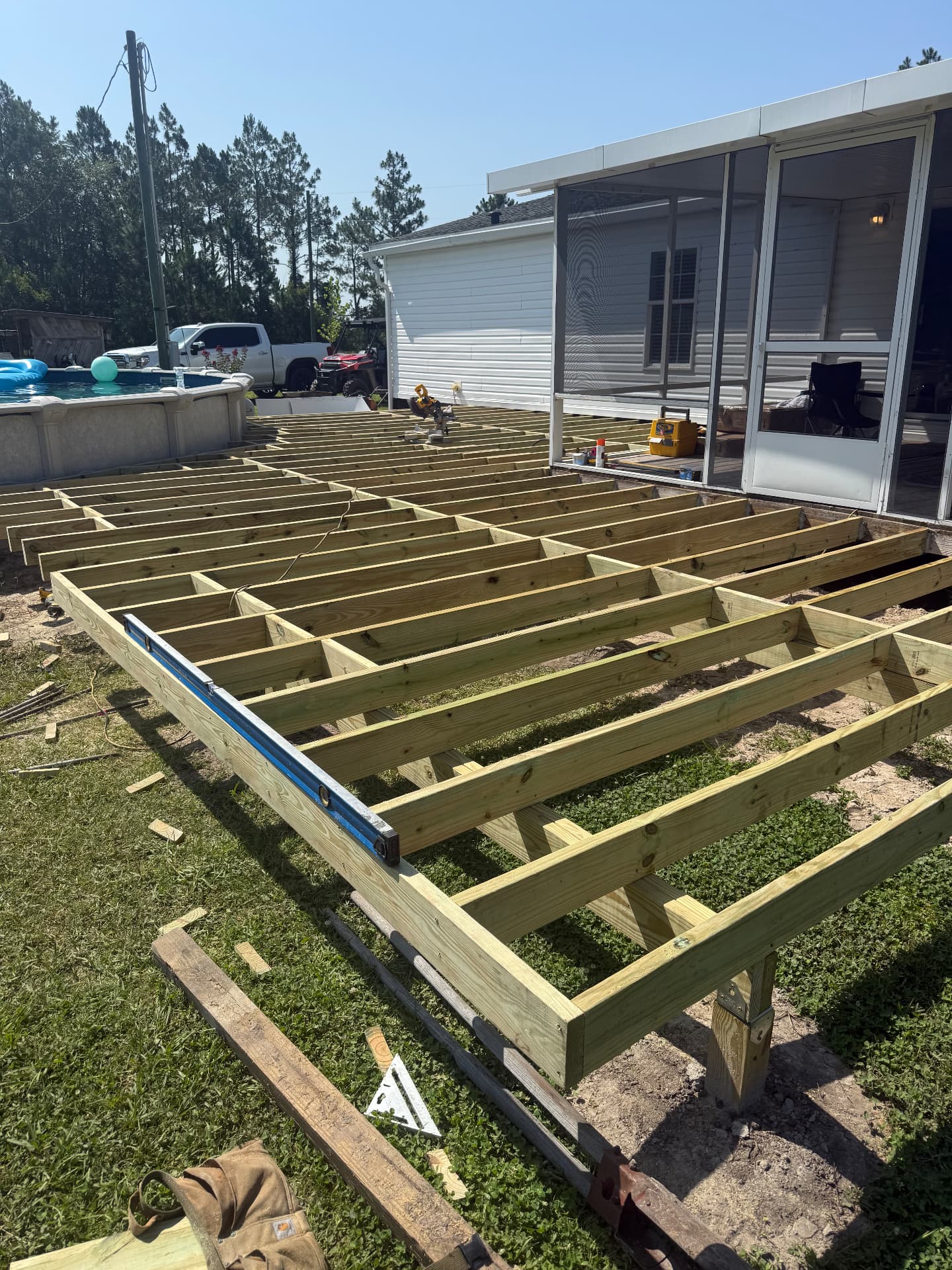Pressure-treated deck framing and joists during construction