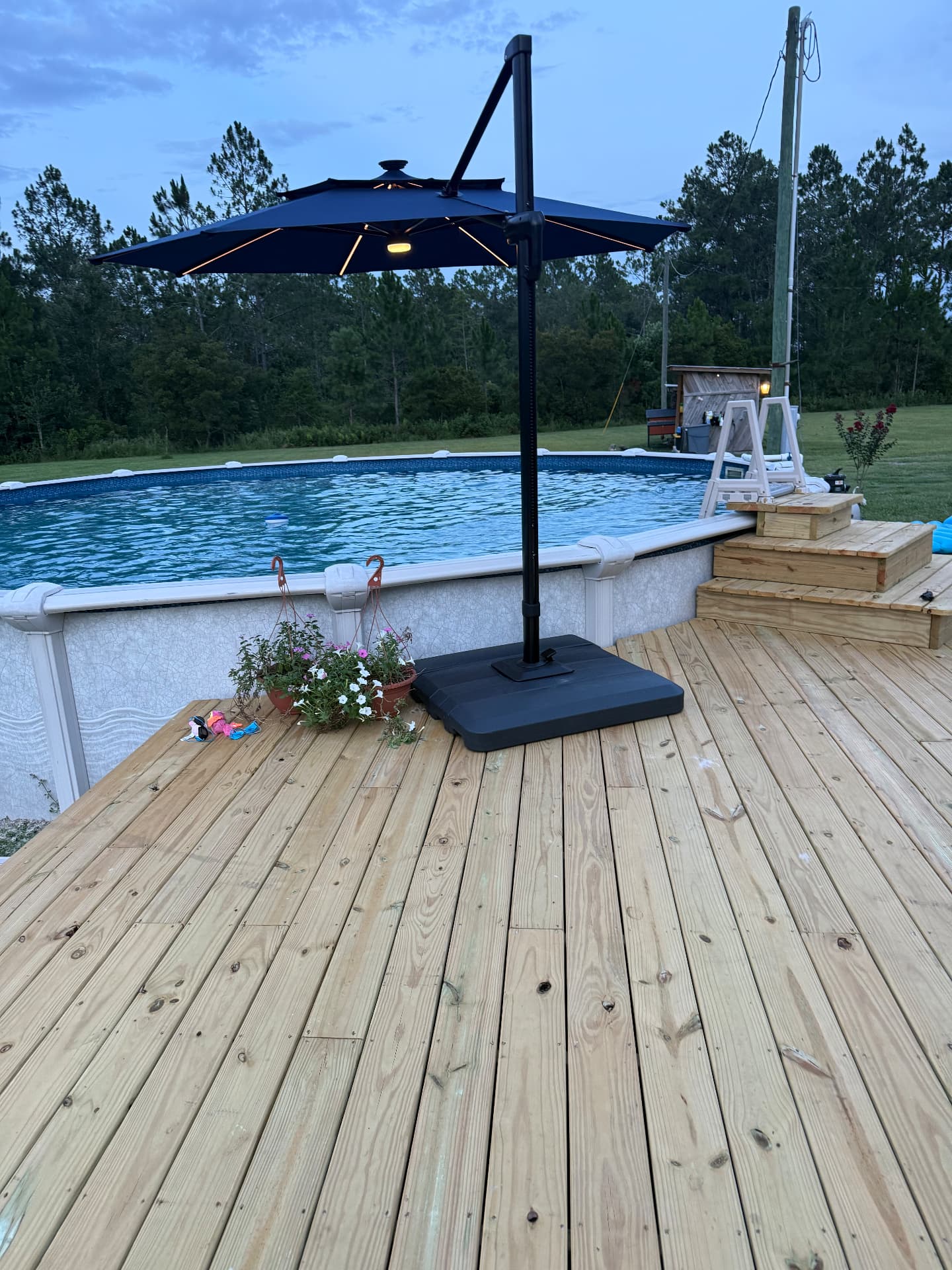 Finished pressure-treated pool deck with custom stairs